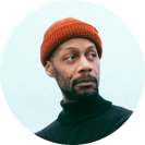 Technician performing garage door spring repair in Dallas